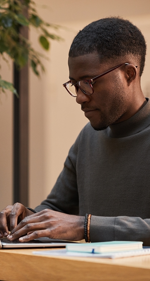 Education professional at his desk