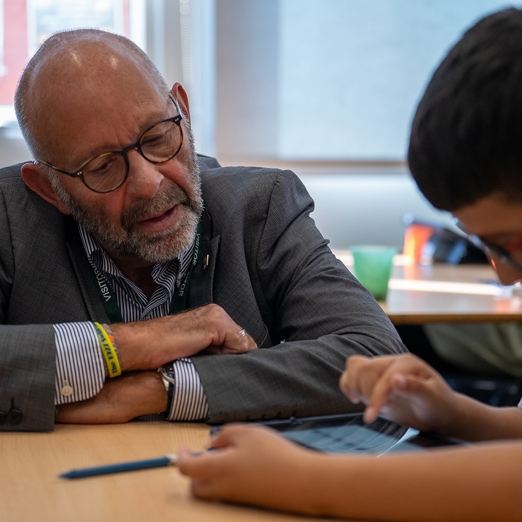 Teach and student in classroom